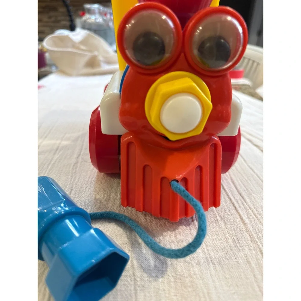 Vintage Take Apart Pull Along Toy Train with Wrench Tool Colors Conductor